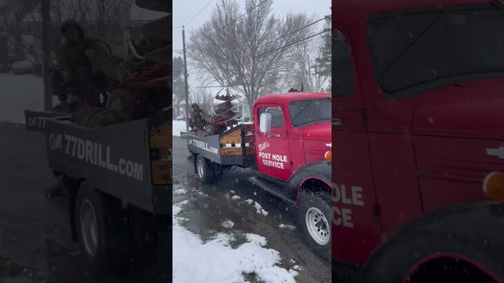 1938 Chevy truck getting loaded with a custom post hole digger 1948 Farmall Cub. #chevy