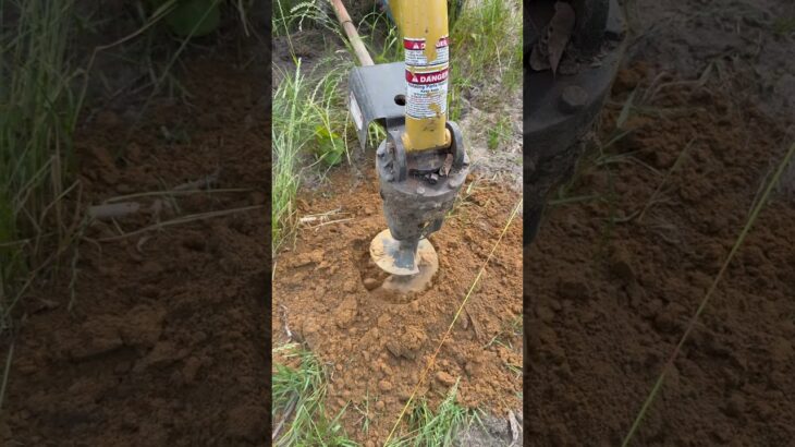 Digging up dirt for a fence #auger #tractor #digging #dirt #sunnyday